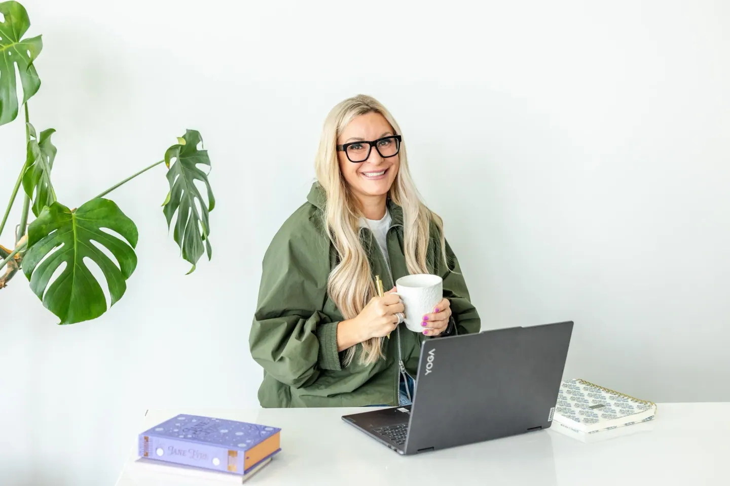 Kahren with coffee and her laptop